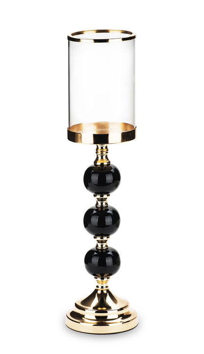 Sfeșnic din metal și sticlă, auriu cu trei bile negre, 44x11x11 cm, cu design elegant și modern, perfect pentru a adăuga stil și rafinament decorului casei, un obiect decorativ potrivit pentru living sau ocazii speciale.