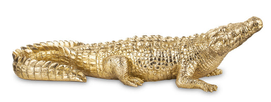 Figurină decorativă crocodil auriu, un obiect statement care adaugă lux și personalitate oricărui spațiu. Perfectă pentru living, birou sau spații moderne, această piesă atrage instant atenția. Este ideală pentru decor sofisticat sau cadou unic și nonconformist.
