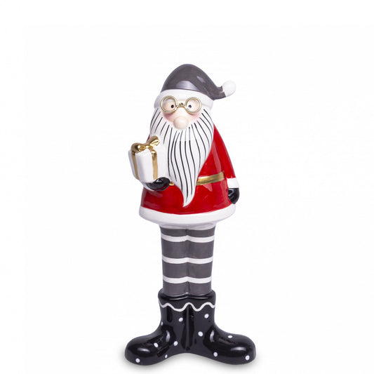 Figurina Moș Crăciun cu cadou este un element decorativ clasic pentru perioada sărbătorilor și poate completa cu ușurință amenajarea festivă a casei. Așezată pe masă, comodă, raft, etajeră sau în vitrină, poate contribui la crearea unei atmosfere de Crăciun pline de căldură și bucurie. Este potrivită atât pentru locuințe, cât și pentru spații comerciale, birouri sau vitrine tematice. Figurina poate fi oferită ca dar de Crăciun pentru copii