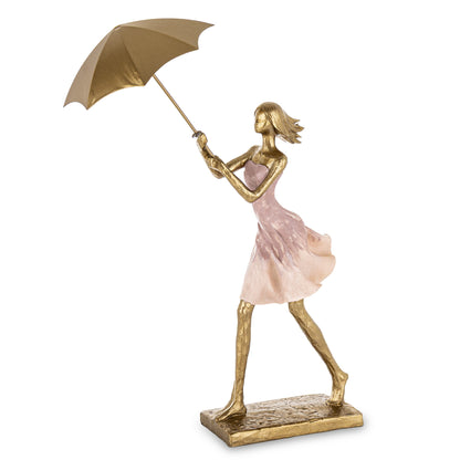 Figurină decorativă femeie cu umbrelă, simbol al eleganței, protecției și rafinamentului artistic. Este perfectă pentru decorul livingului sau biroului, adăugând stil și personalitate. Ideală ca dar pentru aniversări, cadouri corporate, casă nouă sau persoane pasionate de artă și decor elegant.