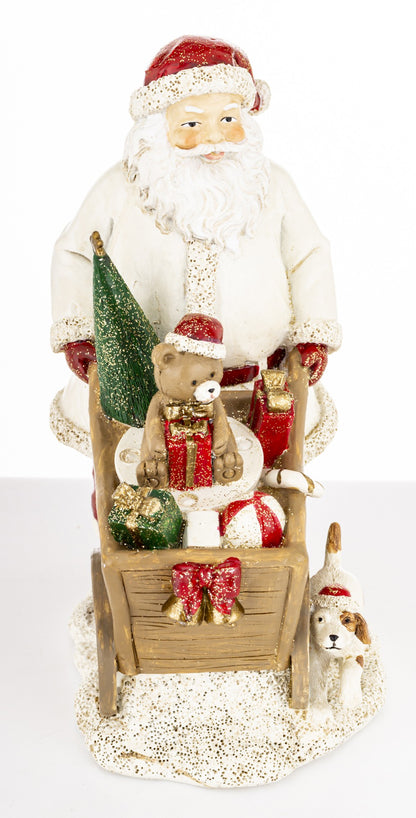 Figurină Moș Crăciun cu roabă de cadouri pentru decorarea casei cu stil și personalitate. Descoperă un obiect decorativ potrivit pentru Crăciun, cadouri pentru.