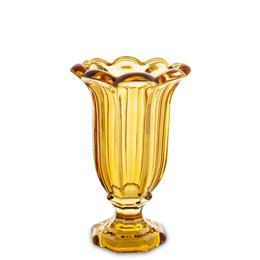 Vază din sticlă masivă cu picior galben, ideală pentru decor vibrant, modern și plin de energie. Este perfectă pentru flori mari sau aranjamente decorative spectaculoase. Adaugă un accent colorat și vesel în living, dining sau spații creative.