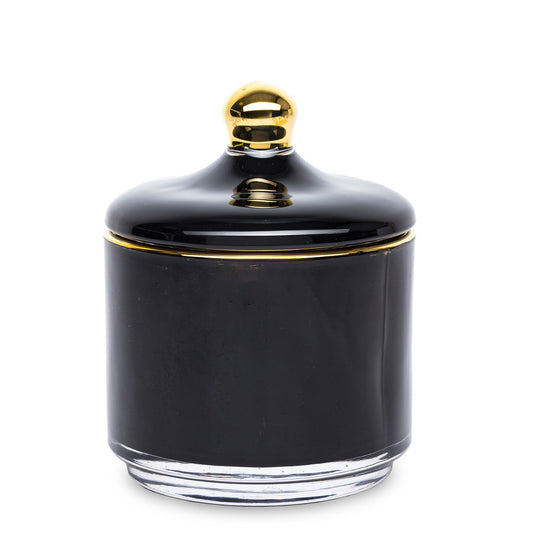 Bombonieră elegantă din sticlă negru cu detalii aurii, perfectă pentru depozitarea bomboanelor sau ca obiect decorativ premium. Este ideală pentru living, dining sau birou, adăugând un accent luxos și sofisticat. Perfectă ca dar de casă nouă sau aniversări.