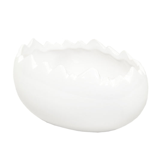 Ghiveci decorativ din ceramică albă în formă de ou, ideal pentru plante mici, decor de Paște sau aranjamente creative de primăvară. Este o piesă minimalistă și elegantă care adaugă un aer curat și festiv în orice spațiu. Perfect ca dar sezonier.