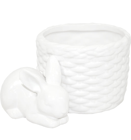 Ghiveci decorativ din ceramică albă cu design iepure, ideal pentru plante mici, suculente sau decor de Paște și primăvară. Este o piesă veselă și luminoasă care aduce un aer cald în orice spațiu. Perfect ca decor sau cadou sezonier pentru familie sau casă nouă.
