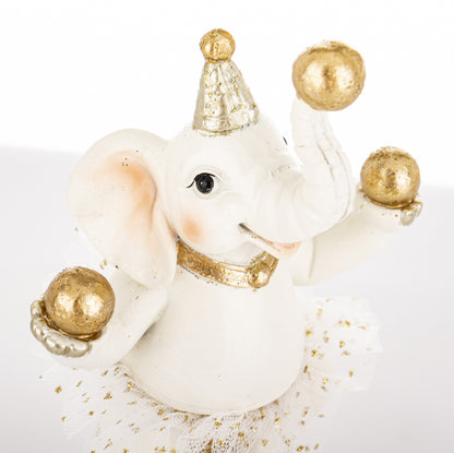 Figurină elefant jonglând cu mingi