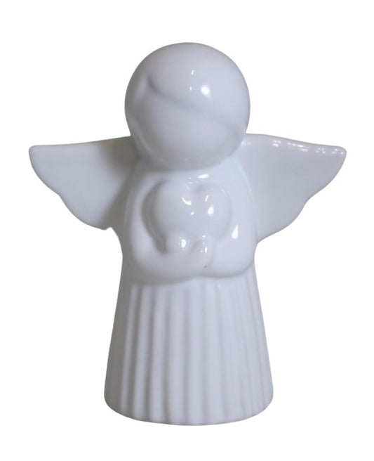 Figurină decorativă înger realizată din ceramică albă elegantă, simbol al purității, protecției și liniștii sufletești. Este perfectă pentru decorarea livingului, dormitorului sau colțurilor spirituale și adaugă un accent delicat și armonios oricărui spațiu interior. Designul său simplu și rafinat o transformă într-un obiect decorativ versatil și într-un cadou emoțional potrivit pentru botez, aniversări, Crăciun sau casă nouă.