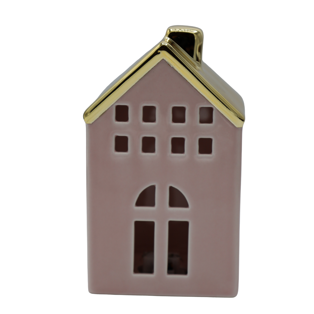 Căsuță decorativă realizată din ceramică roz cu iluminare LED delicată, creată pentru a aduce căldură și rafinament decorurilor moderne și feminine. Lumina ambientală și designul elegant transformă această piesă într-un accesoriu perfect pentru living, dormitor, camera copiilor sau decoruri de sărbători. Este ideală pentru interioare cozy și reprezintă o alegere inspirată pentru cadouri oferite femeilor, copiilor sau persoanelor pasionate de accesorii decorative elegante.