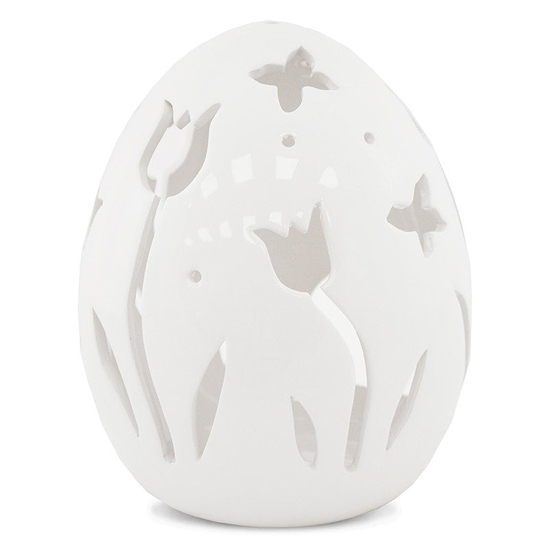 Ou decorativ din ceramică albă cu flori, ideal pentru Paște și decor de primăvară. Este o piesă delicată și elegantă, perfectă pentru mese festive sau vitrine decorative. Adaugă un aer proaspăt și rafinat în orice spațiu.
