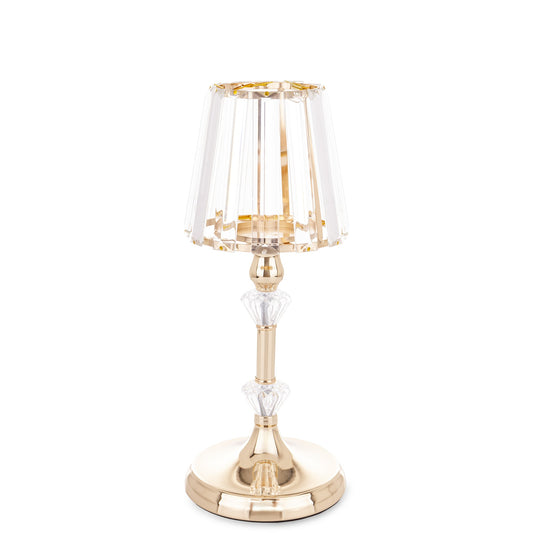 Sfeșnic decorativ elegant auriu cu detalii din cristale strălucitoare, conceput pentru a adăuga un efect de lux și rafinament oricărui spațiu. Lumina lumânărilor se reflectă spectaculos în cristale, creând o atmosferă caldă și sofisticată. Ideal pentru living, dining, evenimente speciale sau cadouri premium de casă nouă și aniversări.