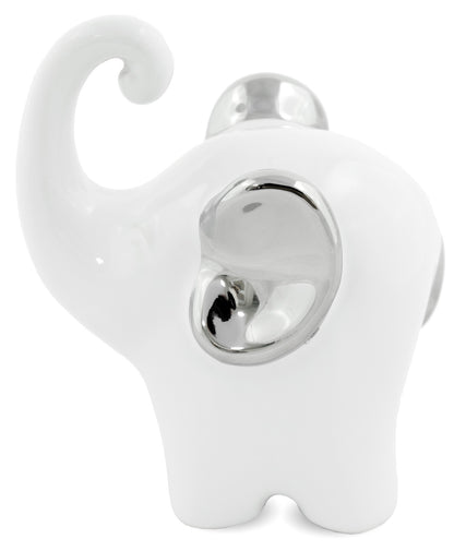 Figurină decorativă elefant cu urechi argintii, simbol al norocului, protecției și stabilității. Este ideală pentru decorul casei sau biroului și aduce energie pozitivă și eleganță. Perfectă ca dar simbolic pentru familie sau prieteni.