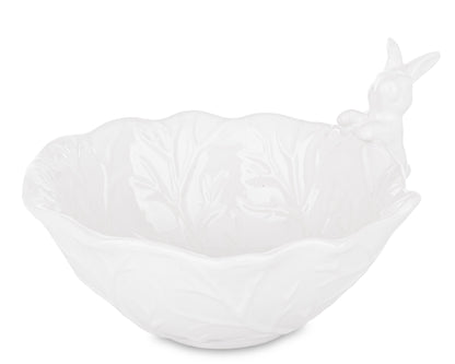 Bol decorativ din ceramică albă cu iepuraș, ideal pentru Paște, primăvară sau decor vesel de bucătărie și dining. Este o piesă practică și decorativă, perfectă pentru ouă decorative, bomboane sau mici aranjamente festive. Adaugă un aer cald și elegant în casă.
