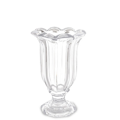 Vază decorativă din sticlă masivă cu picior transparent, ideală pentru aranjamente florale spectaculoase sau decor minimalist elegant. Se potrivește perfect în living modern, dining sau spații luminoase. O piesă versatilă și rafinată pentru orice tip de interior.