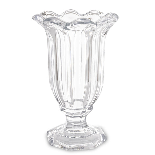 Vază decorativă din sticlă masivă cu picior transparent, ideală pentru aranjamente florale spectaculoase sau decor minimalist elegant. Se potrivește perfect în living modern, dining sau spații luminoase. O piesă versatilă și rafinată pentru orice tip de interior.