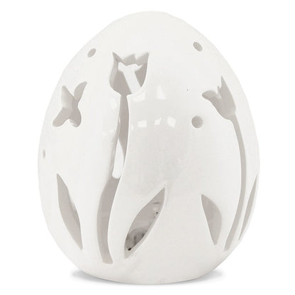 Ou decorativ din ceramică albă cu flori, ideal pentru Paște și decor de primăvară. Este o piesă delicată și elegantă, perfectă pentru mese festive sau vitrine decorative. Adaugă un aer proaspăt și rafinat în orice spațiu.