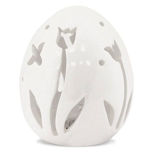 Ou decorativ din ceramică albă cu flori, ideal pentru Paște și decor de primăvară. Este o piesă delicată și elegantă, perfectă pentru mese festive sau vitrine decorative. Adaugă un aer proaspăt și rafinat în orice spațiu.