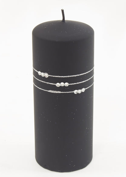 Lumânare neagră pietre decor elegant modern